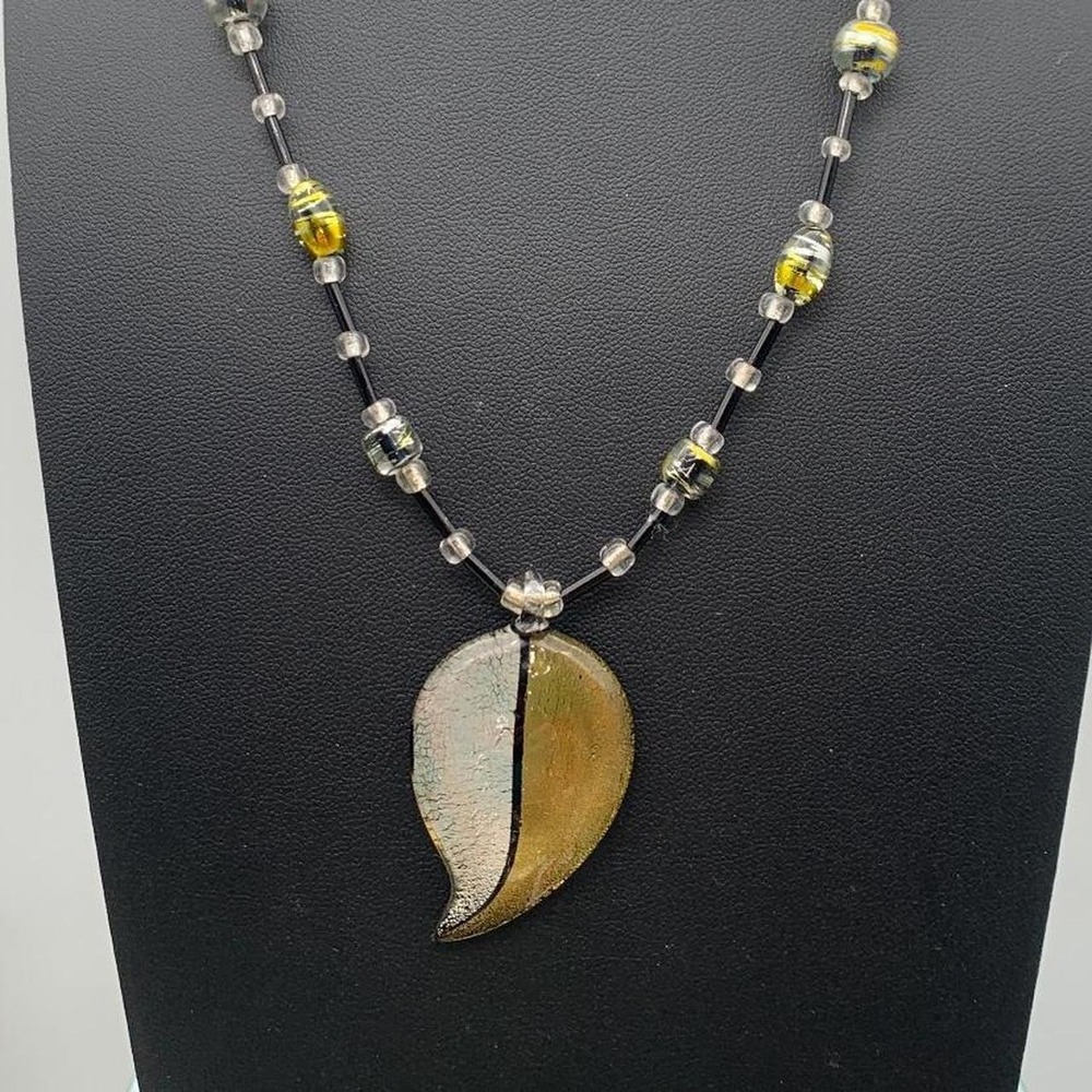 Yellow and black art glass leaf necklace with seed and art glass beads